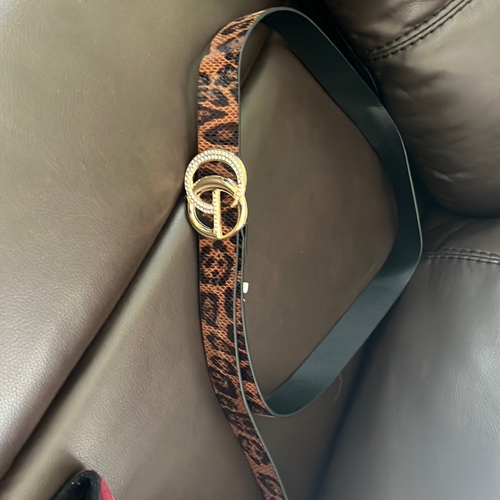 Cheetah printed belt with gems.